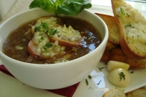 French onion soup with Guinness and mozzarella baguettes